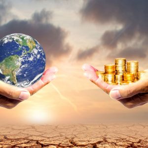 Illustration of one hand holding the earth and another person's hand holding money